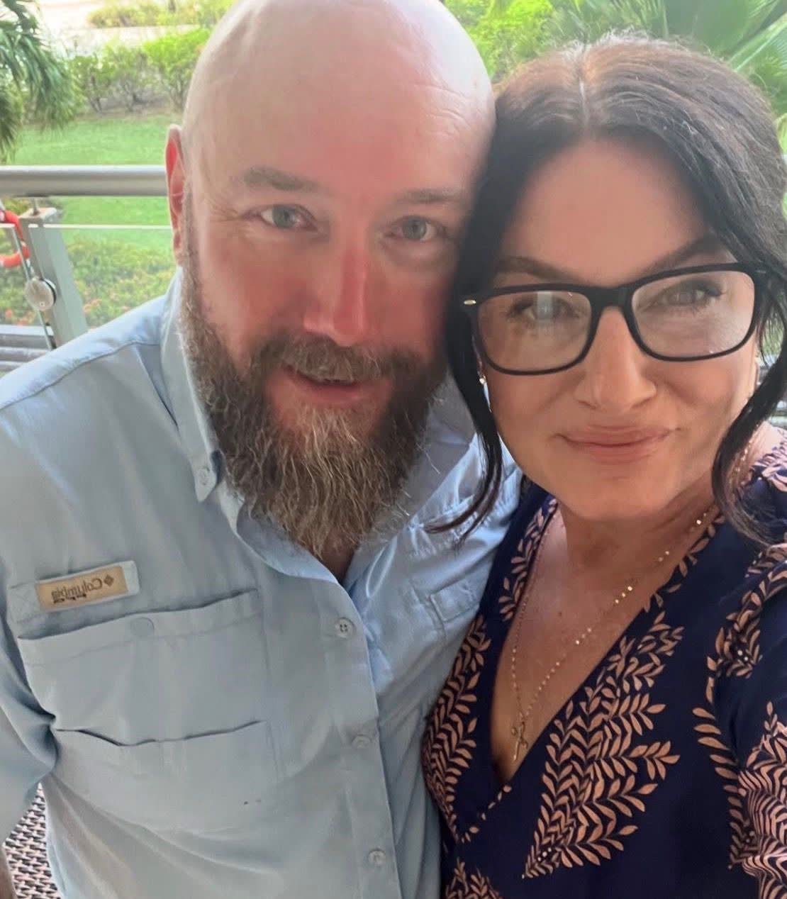Tim Salomone and Michele Parker, the owners of TM Construction, photographed together outdoors